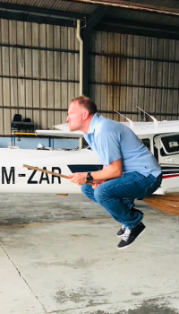 Captain Reuber with the broomstick rating.